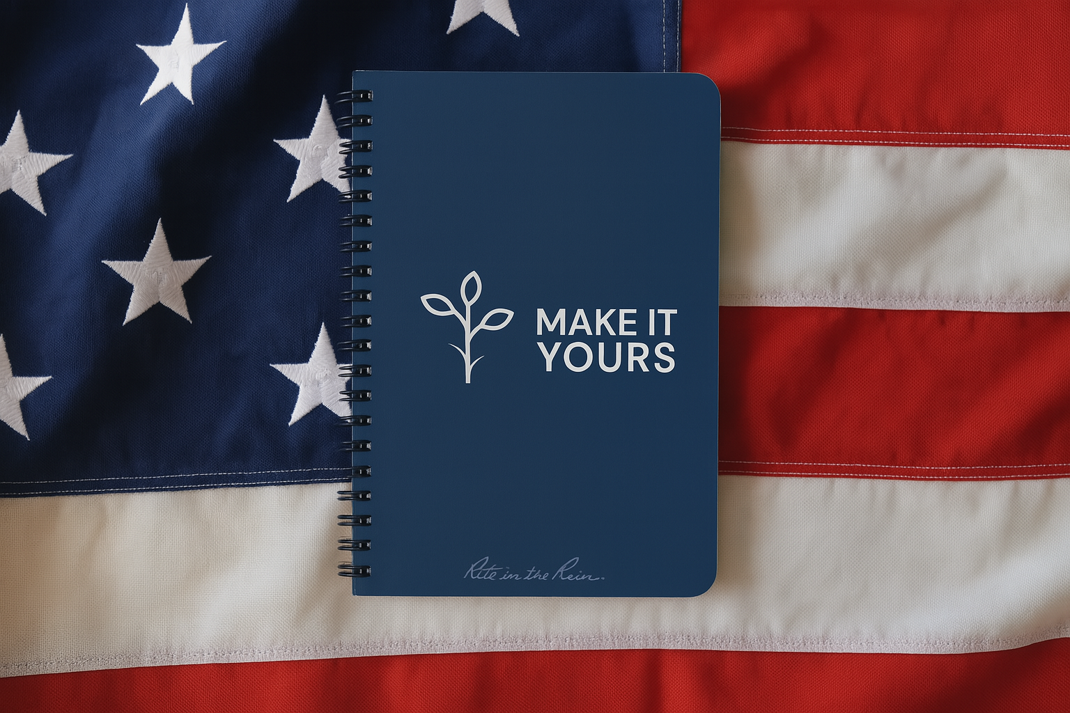 A notebook laying on top of an American flag