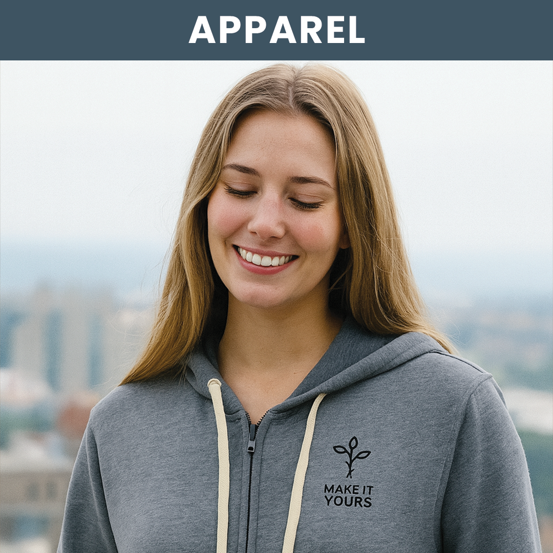 Lifestyle image of woman wearing a hoodie smiling