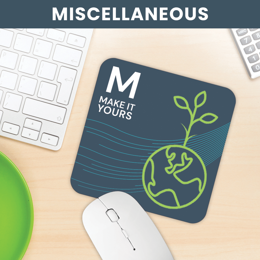 Lifestyle image of a mousepad on a desk with keyboard and computer mouse