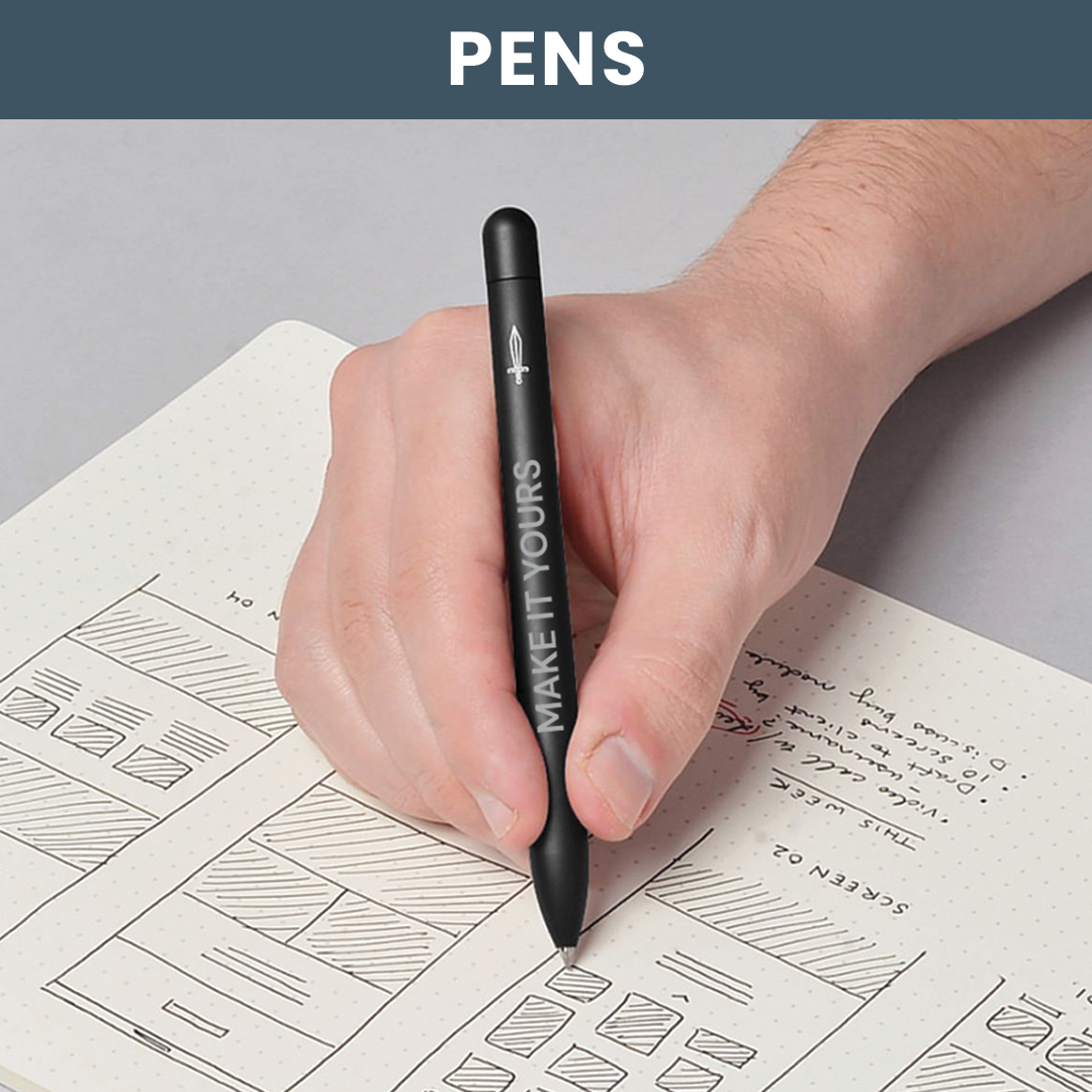 Lifestyle image of hand holding a pen and writing on paper