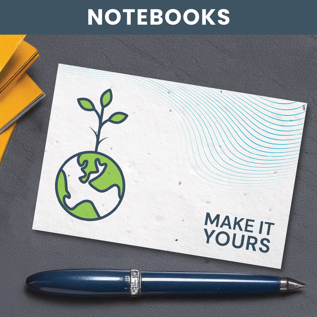 Lifestyle image of seed paper postcard on desk with fountain pen underneath it